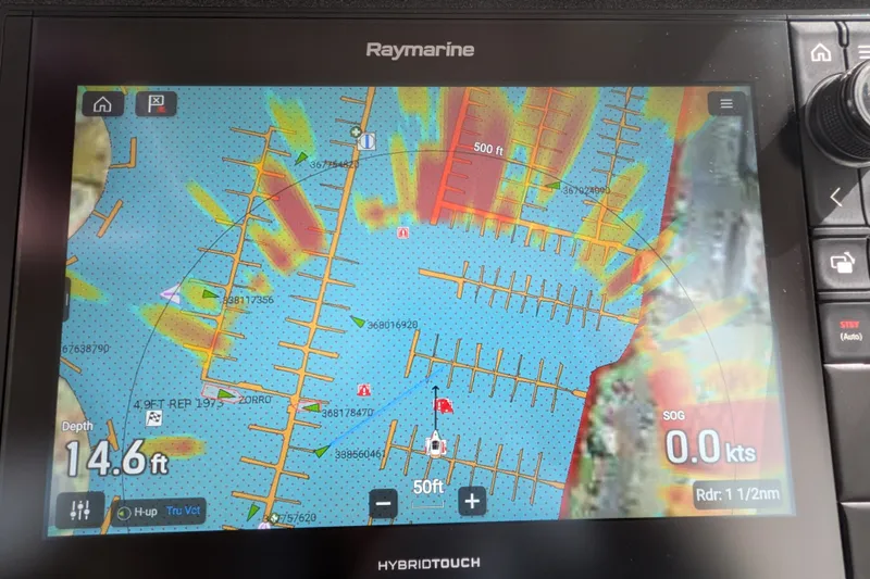 Slide: The Image of Raymarine navigation display on 2010 Nordic Tug 32, showing depth and nautical chart. - 33