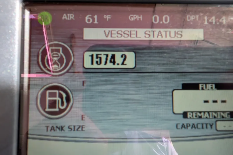 Slide: The Image of Vessel status display on 2010 Nordic Tug 32, showing air temperature and fuel information. - 31