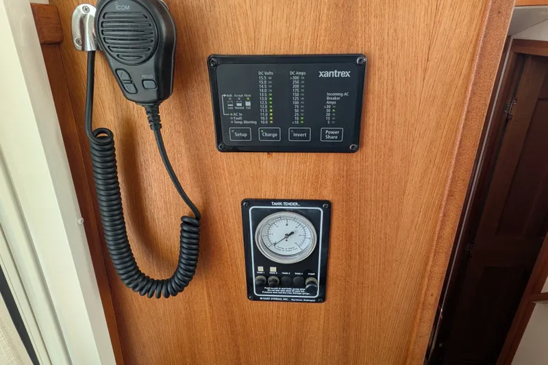 Slide: The Image of Control panel and radio on a 2010 Nordic Tug 32 boat interior. - 29