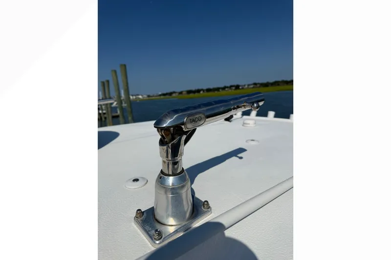 Slide: The Image of 2021 Sea Hunt Gamefish 30FS boat with TACO marine hardware, docked by the water. - 13