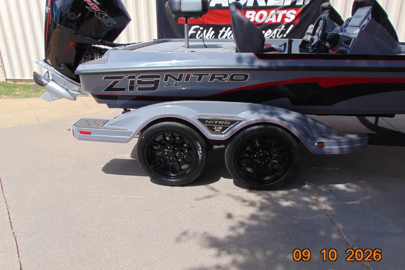 Slide: The Image of 2027 Nitro Z19 XL Pro boat on trailer, showcasing sleek design and modern features. - 89