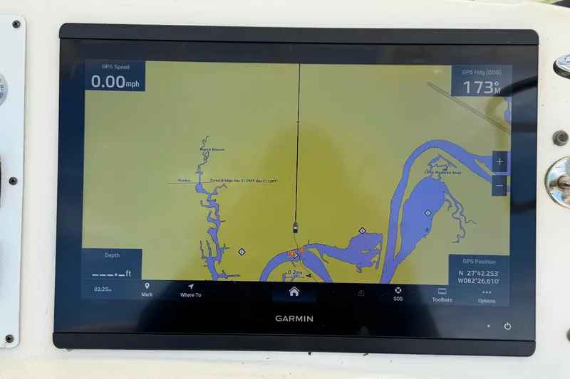 Slide: The Image of Garmin GPS display on 2015 NauticStar 231 Coastal boat, showing navigation map. - 26