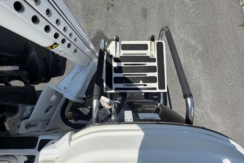 Slide: The Image of 2015 NauticStar 231 Coastal boat ladder and platform, top view. - 73