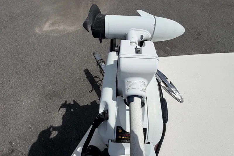 Slide: The Image of Trolling motor on 2015 NauticStar 231 Coastal boat, parked on asphalt surface. - 47