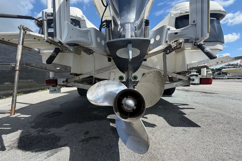 Slide: The Image of Rear view of a 2015 NauticStar 231 Coastal boat with visible propeller. - 4