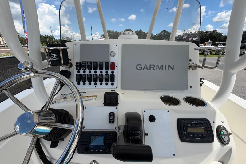 Slide: The Image of 2015 NauticStar 231 Coastal boat dashboard with Garmin navigation system. - 22