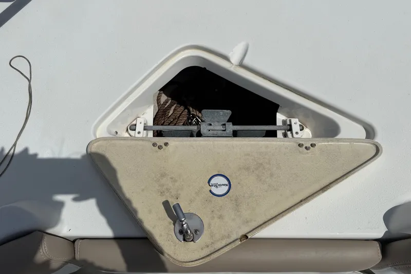 Slide: The Image of Open hatch on 2015 NauticStar 231 Coastal boat deck. - 46