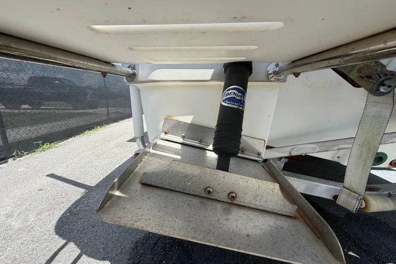 Slide: The Image of 2015 NauticStar 231 Coastal boat underside with Bennett trim tab system. - 6