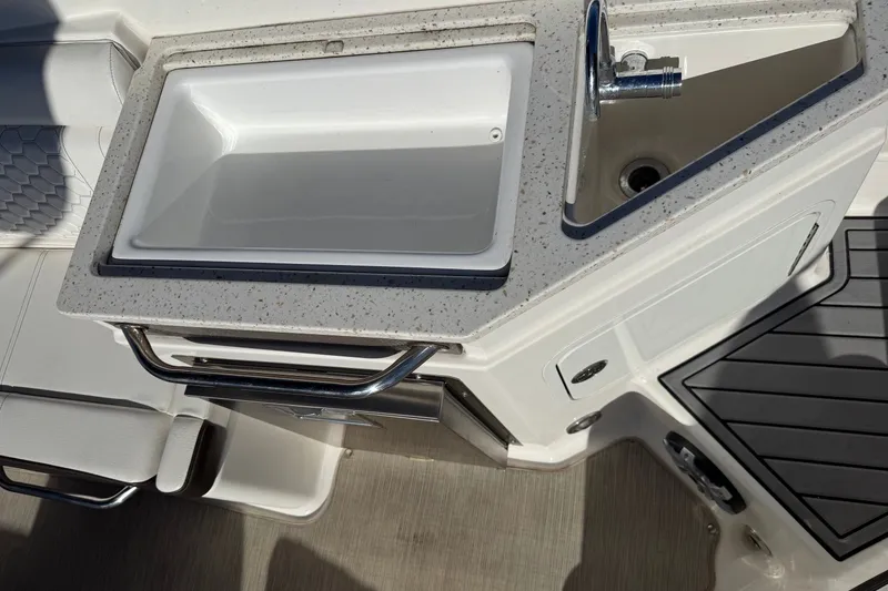 Slide: The Image of 2019 Sea Ray SDX 290 Outboard boat sink and countertop detail. - 19