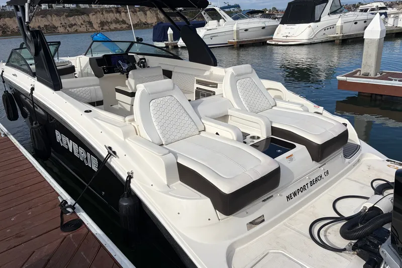 Slide: The Image of 2019 Sea Ray SDX 290 Outboard boat docked at Newport Beach marina. - 10