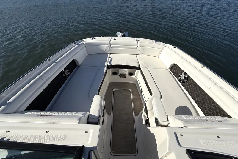 Slide: The Image of 2019 Sea Ray SDX 290 Outboard boat interior with spacious seating on water. - 33