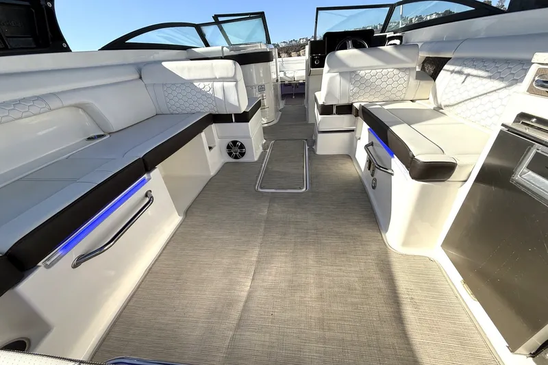 Slide: The Image of 2019 Sea Ray SDX 290 Outboard interior with luxurious seating and modern design. - 15