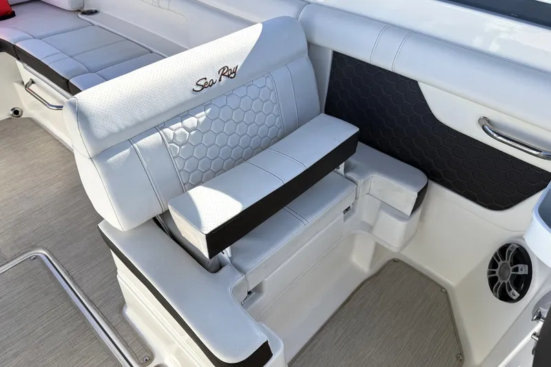 Slide: The Image of 2019 Sea Ray SDX 290 Outboard boat interior with luxurious seating and modern design. - 22