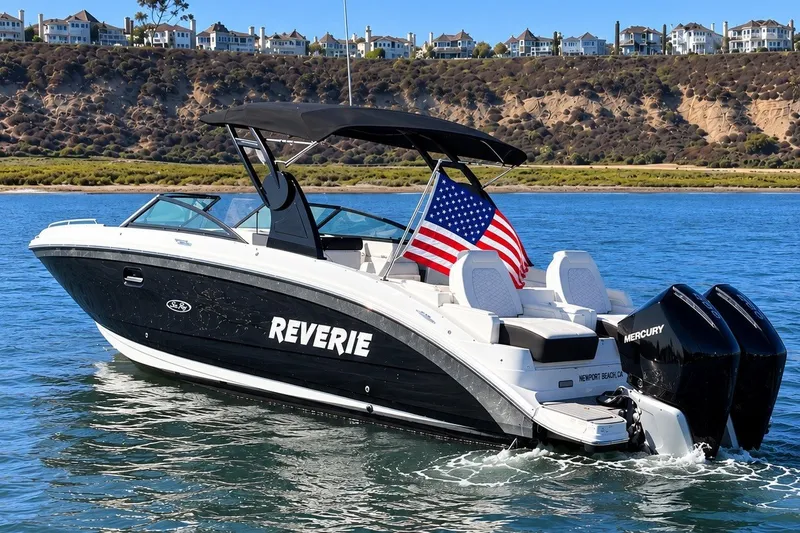 Slide: The Image of 2019 Sea Ray SDX 290 Outboard boat on water, American flag, coastal background. - 1