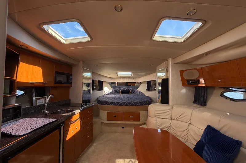 Slide: The Image of Interior of 2003 Formula 37 Performance Cruiser with cozy seating and modern amenities. - 36