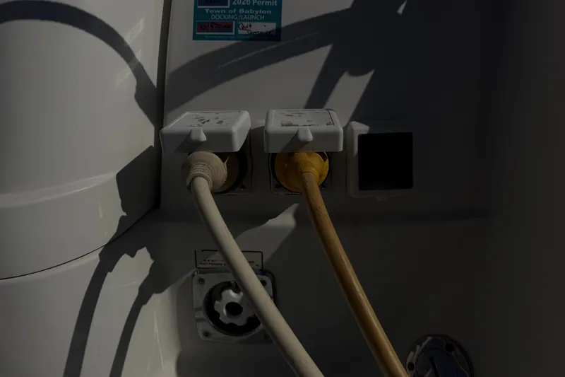Slide: The Image of Power connections on a 2003 Formula 37 Performance Cruiser boat. - 61