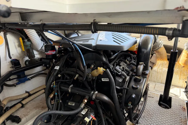 Slide: The Image of Engine compartment of a 2003 Formula 37 Performance Cruiser, showcasing detailed mechanical components. - 55