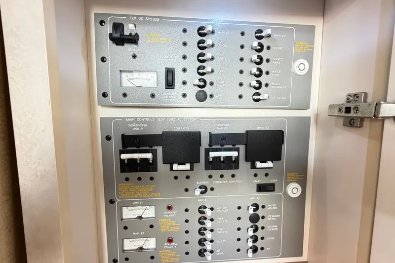 Slide: The Image of Electrical control panel of a 2003 Formula 37 Performance Cruiser boat. - 43