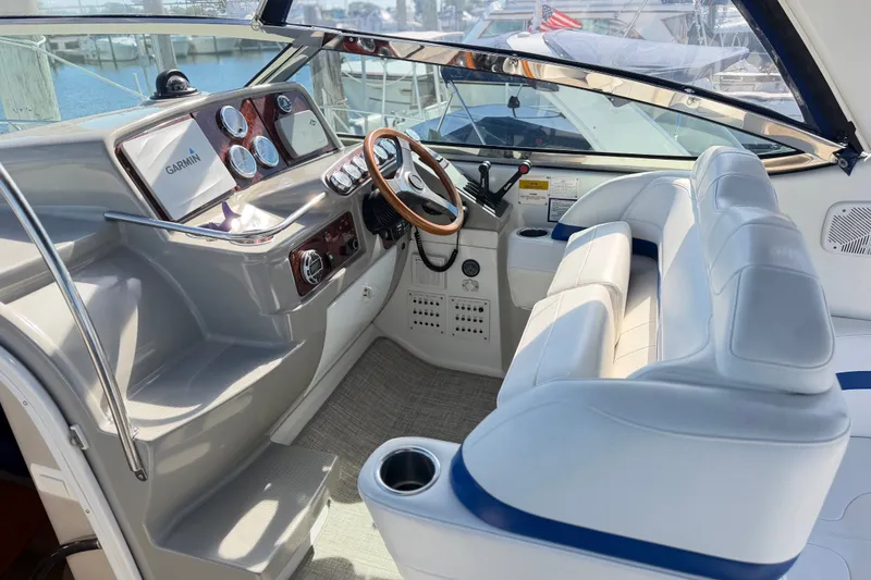 Slide: The Image of 2003 Formula 37 Performance Cruiser cockpit with modern navigation and plush seating. - 20
