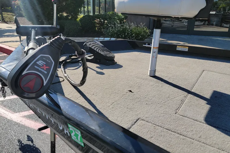 Slide: The Image of 2008 Crestliner CX 17 Bass boat deck with trolling motor and seat in sunlight. - 7