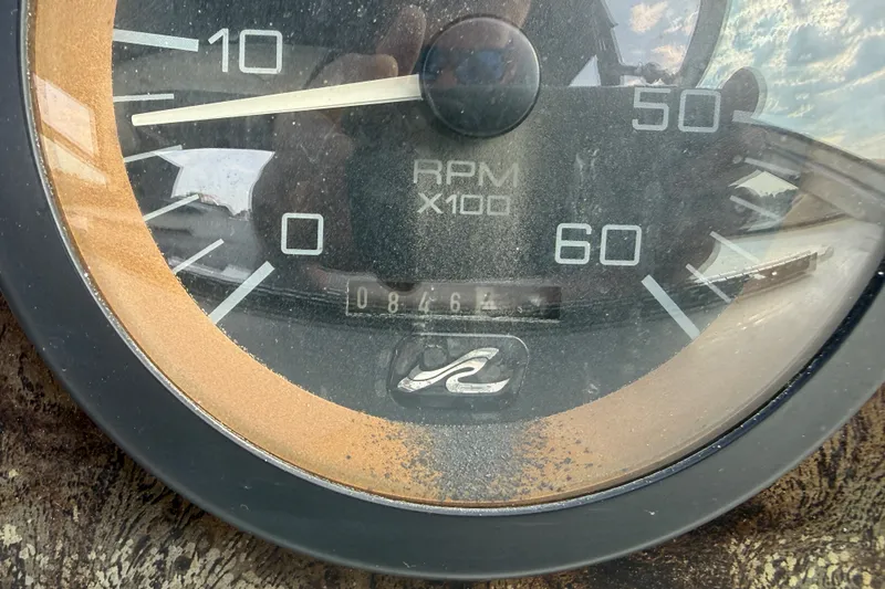 Slide: The Image of Close-up of a 1996 Sea Ray Sundancer 370 RPM gauge showing 816 hours. - 21