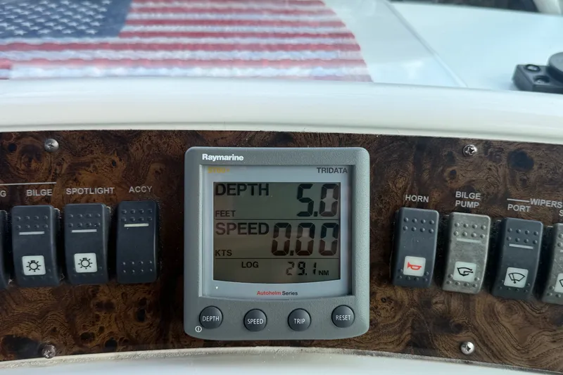 Slide: The Image of Control panel of a 1996 Sea Ray Sundancer 370 with Raymarine display showing depth and speed. - 23
