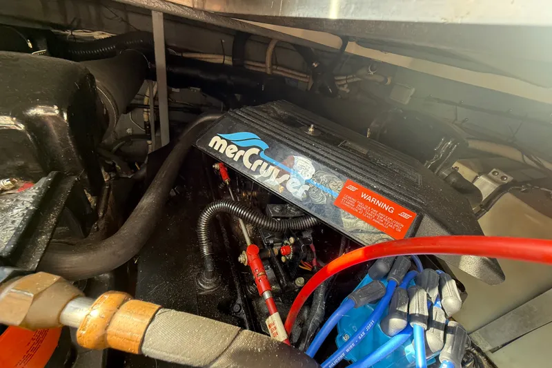 Slide: The Image of Engine compartment of a 1996 Sea Ray Sundancer 370 with MerCruiser components. - 69