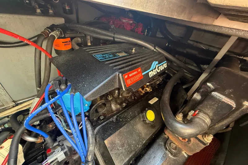 Slide: The Image of Engine compartment of a 1996 Sea Ray Sundancer 370 with MerCruiser components. - 67