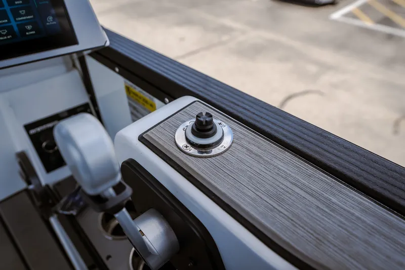 Slide: The Image of Control panel of 2025 Montara 25 Surf Boss boat, featuring sleek design and modern controls. - 46