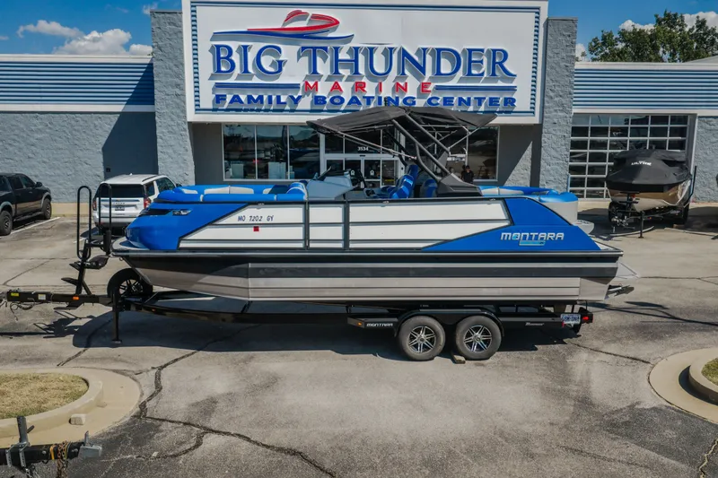 Slide: The Image of 2025 Montara 25 Surf Boss boat on trailer at Big Thunder Marine dealership. - 48