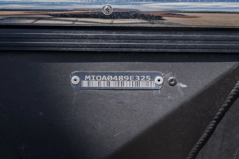 Slide: The Image of 2025 Montara 25 Surf Boss identification plate with serial number and barcode. - 12