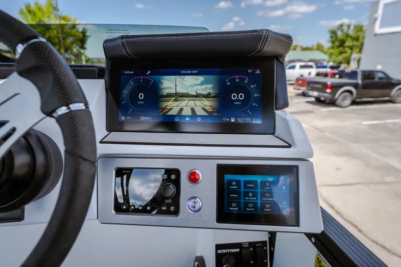 Slide: The Image of Dashboard of 2025 Montara 25 Surf Boss boat with digital displays and controls. - 36