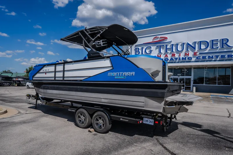 Slide: The Image of 2025 Montara 25 Surf Boss boat at Big Thunder Marine dealership. - 6