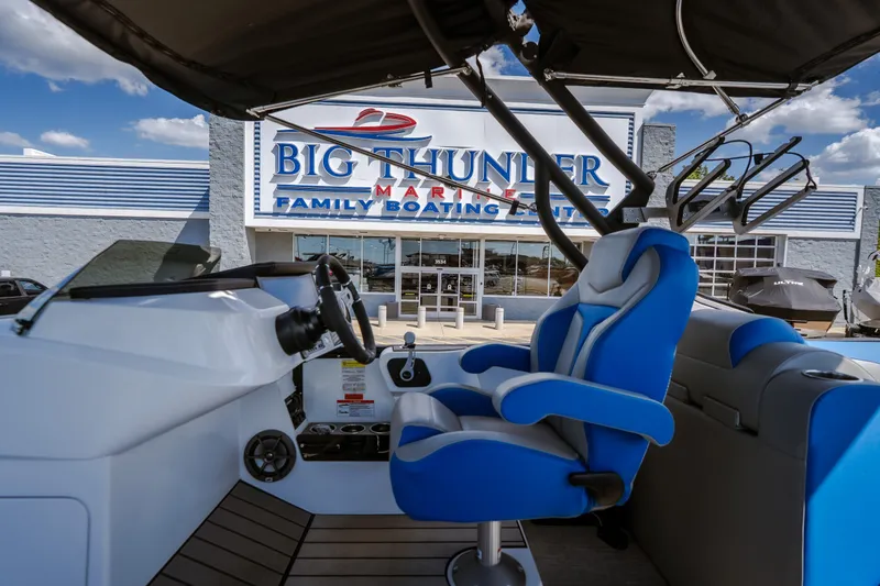 Slide: The Image of Interior of 2025 Montara 25 Surf Boss boat at Big Thunder Marine dealership. - 30