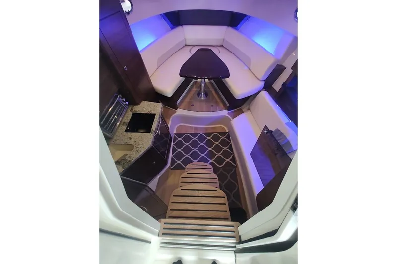 Slide: The Image of Luxurious interior of 2020 Boston Whaler 345 Conquest with seating and kitchenette. - 22