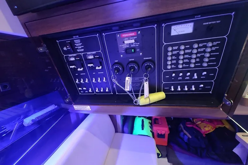 Slide: The Image of Electrical control panel inside a 2020 Boston Whaler 345 Conquest boat cabin. - 28
