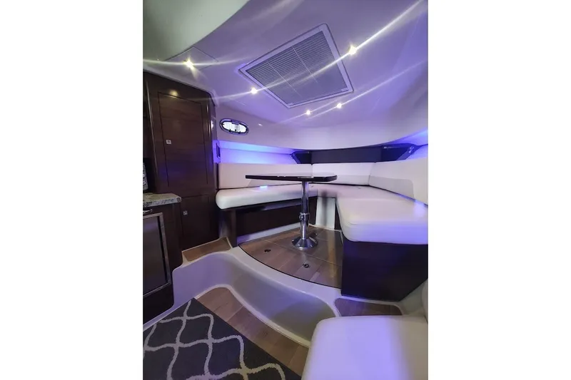 Slide: The Image of Luxurious interior of 2020 Boston Whaler 345 Conquest with modern seating and ambient lighting. - 27