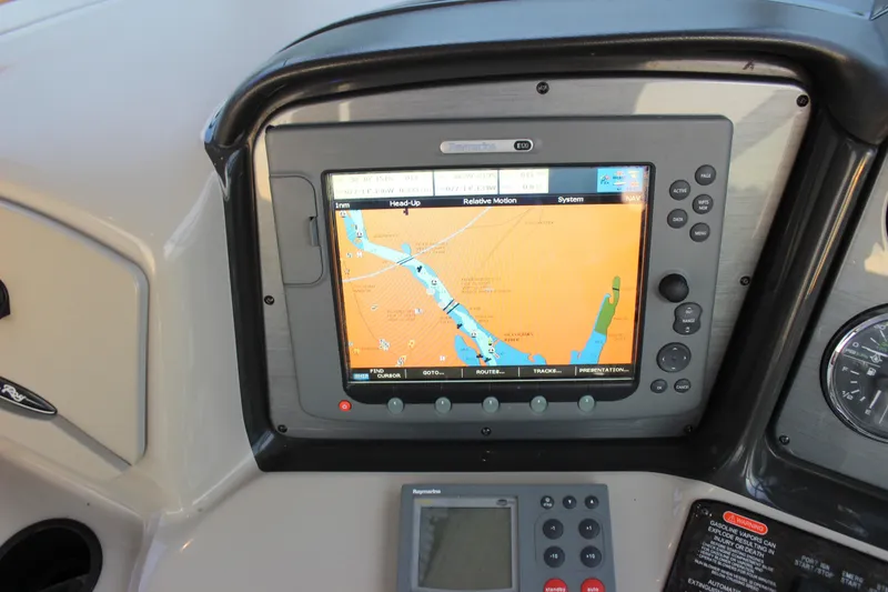Slide: The Image of Navigation system on 2006 Sea Ray 40 Sundancer boat dashboard. - 56
