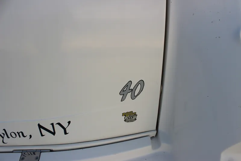 Slide: The Image of 2006 Sea Ray 40 Sundancer boat with "40" and location text, Babylon, NY. - 6