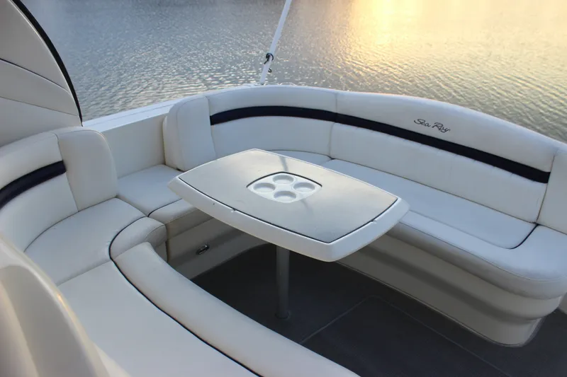 Slide: The Image of Luxurious seating area on a 2006 Sea Ray 40 Sundancer yacht by the water. - 15
