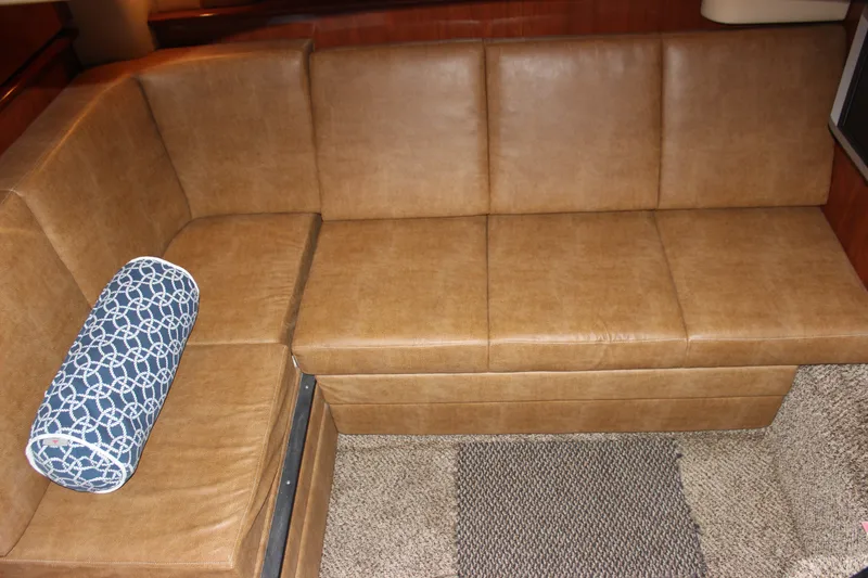 Slide: The Image of Luxurious tan leather seating in 2006 Sea Ray 40 Sundancer yacht interior. - 46