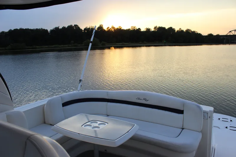 Slide: The Image of 2006 Sea Ray 40 Sundancer yacht at sunset on a tranquil lake. - 16