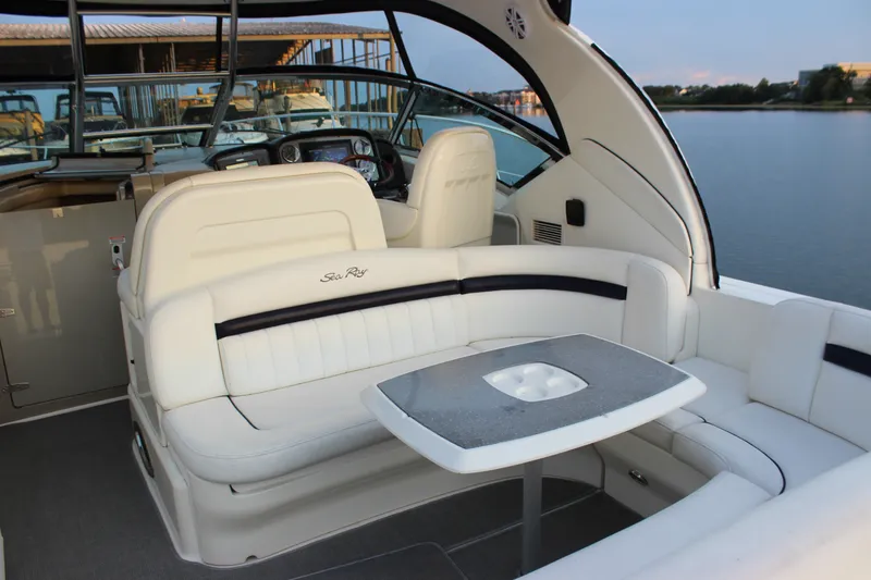 Slide: The Image of Luxurious 2006 Sea Ray 40 Sundancer yacht interior with elegant seating and table. - 10