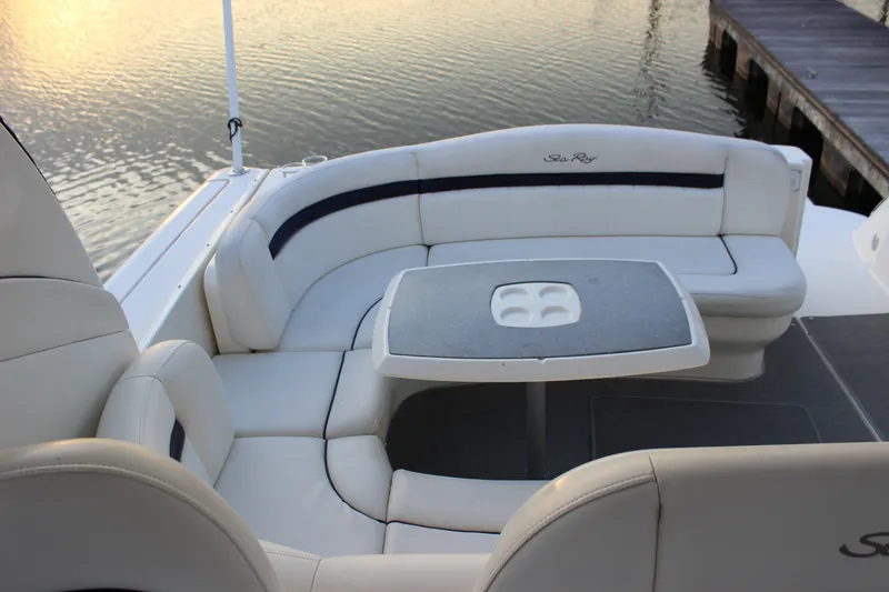 Slide: The Image of Luxurious seating area on a 2006 Sea Ray 40 Sundancer yacht by the water. - 21