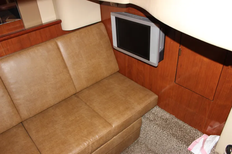 Slide: The Image of Interior of 2006 Sea Ray 40 Sundancer with leather seating and wall-mounted TV. - 47