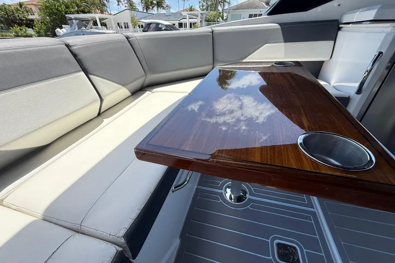 Slide: The Image of Luxurious seating and table on 2021 Cruisers Yachts 38 GLS OB boat. - 28