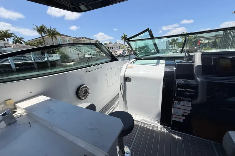 Slide: The Image of Interior view of 2021 Cruisers Yachts 38 GLS OB, featuring sleek design and modern amenities. - 19