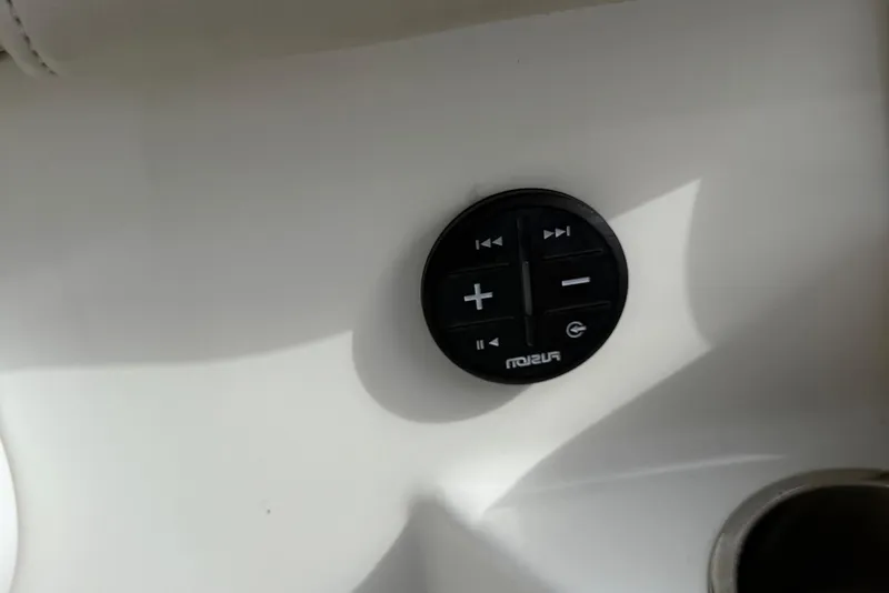 Slide: The Image of Control panel on a 2020 Boston Whaler 330 Outrage boat interior. - 20