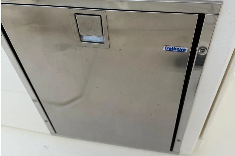 Slide: The Image of Stainless steel compartment on 2020 Boston Whaler 330 Outrage boat. - 19