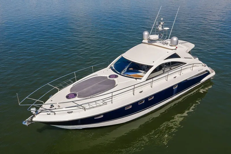 Slide: The Image of 2006 Fairline Targa 47 GT luxury yacht on calm water. - 1